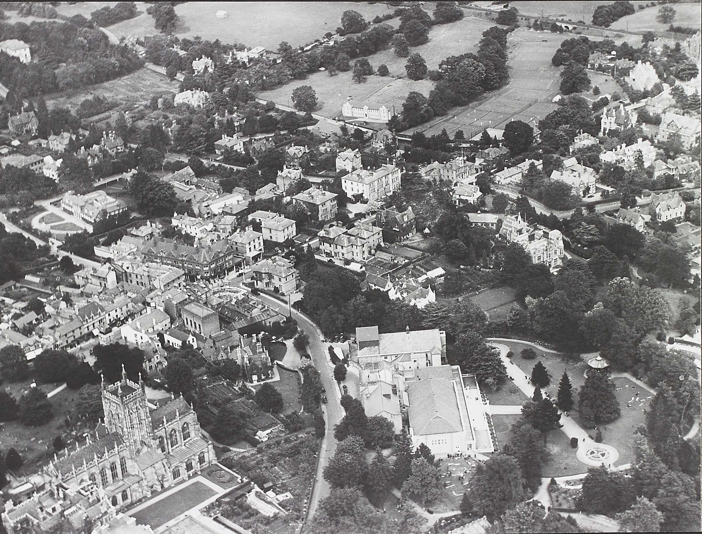 Aerial view of Great Malvern showing the Winter Gardens, Priory and Town dated to 1930