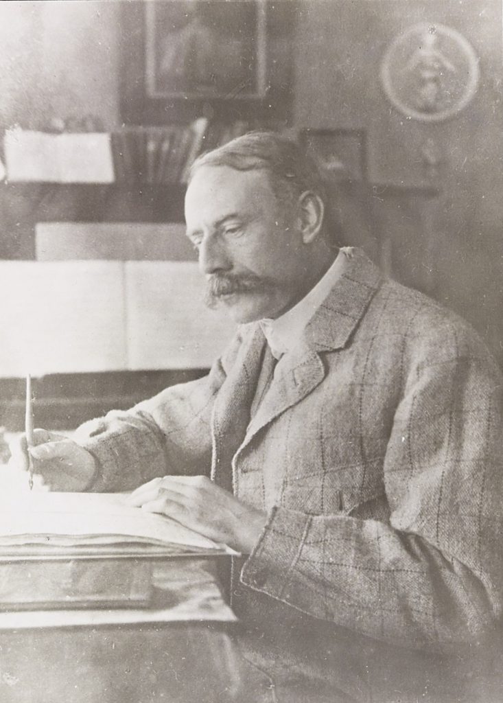 Composer of Sir Edward Elgar sat in his study dated to 1900